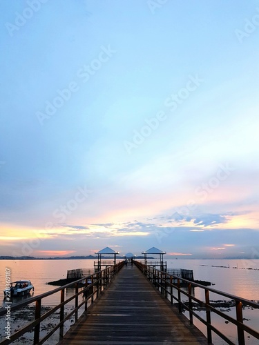 Wooden pier during sunset