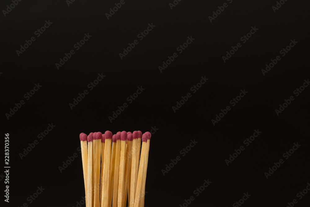 Matches on a black background. Copy space. Matches on a black background. Copy space.