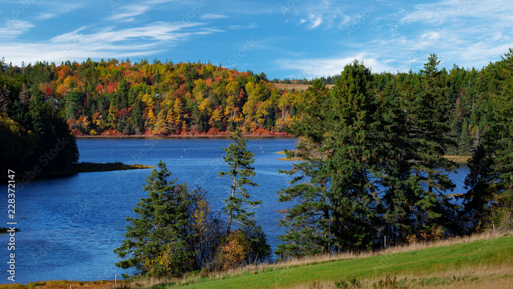 Fall foliage along a river in rural Prince Edward Island, Canada. Fall foliage along a river in rural Prince Edward Island, Canada.