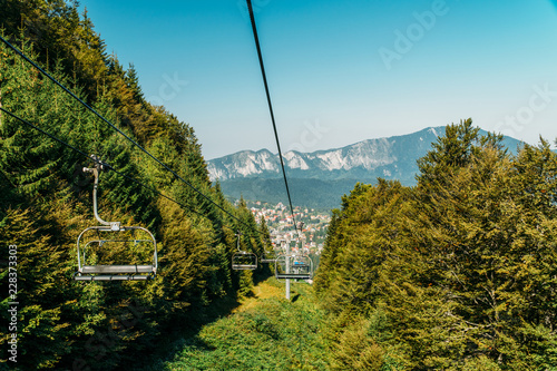 Cable Car Travel In Summer Above Carpathian Mountains In Skiing Resort Of Busteni, Romania