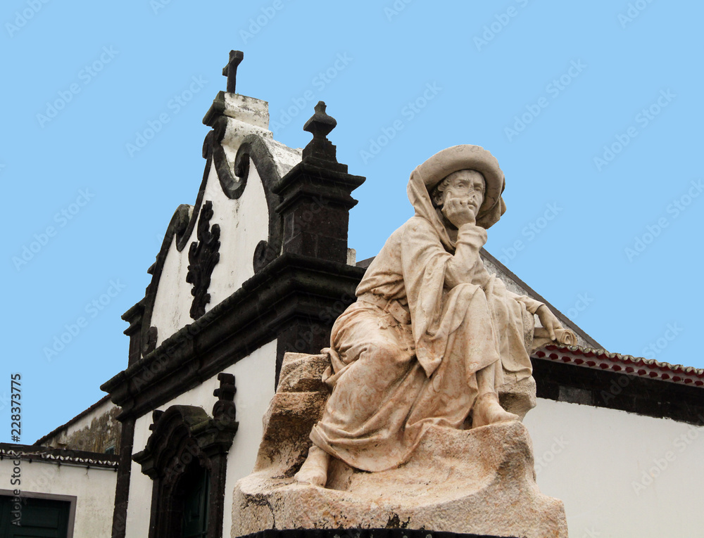 Marble stature and church façade with Baroque architecture, Vila Franca do Campo, São Miguel, Portugal