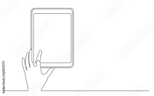 continuous line drawing of hand touching digital tablet