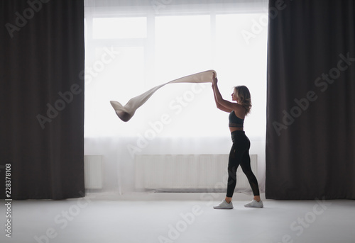 Woman laying stretching mat