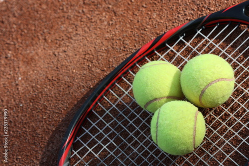 Tennis balls on the court. © dorotaam