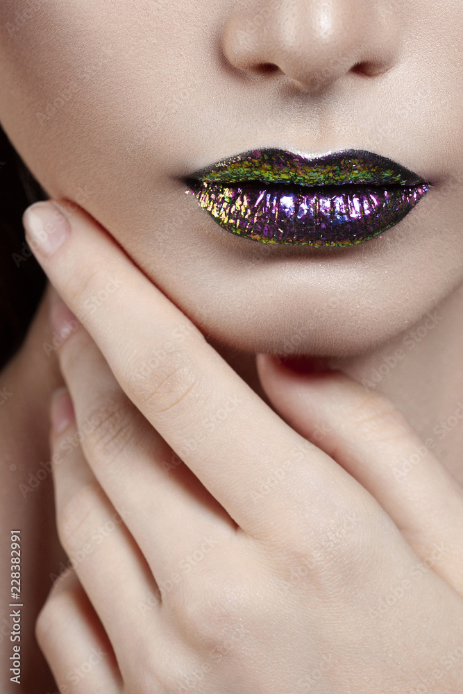 Fototapeta premium Young beautiful girl with purple make-up