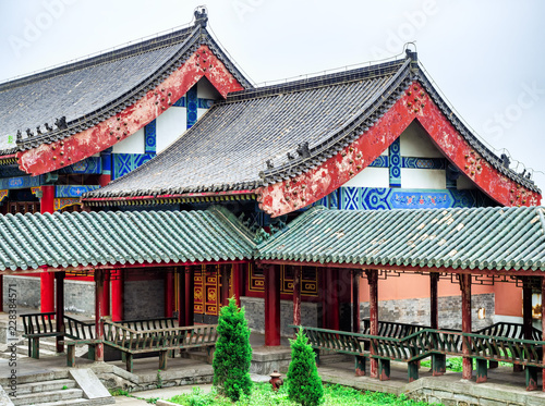 Buddhist Temple with colorful decorative details at the top of the Tianmen Mountain  Hunan Province  Zhangjiajie  China