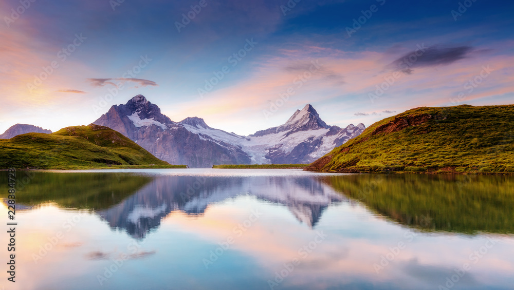 Great view of the snow rocky massif. Location Bachalpsee in Swiss alps, Grindelwald valley.