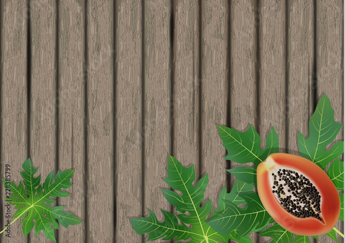 Papaya leaves on wooden background. Exotic leaf banner on wood. Vector