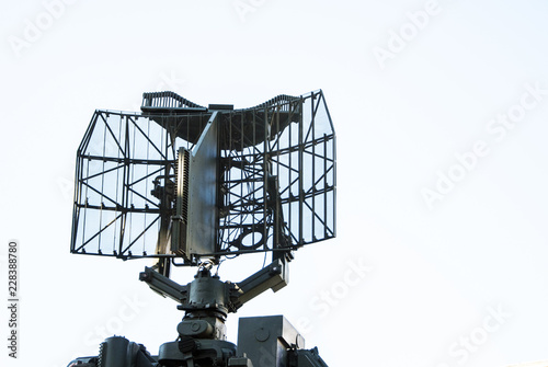 Air defense radar of military mobile mighty rocket launcher system on sky backgroud