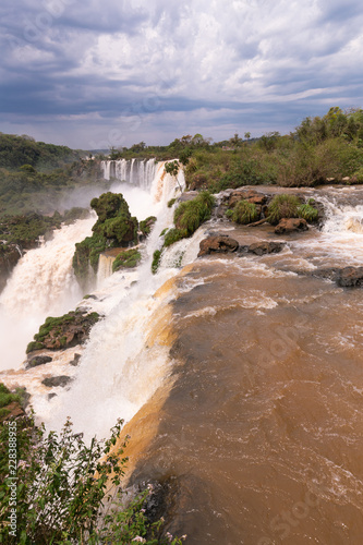 Breathtaking view of the Iguazu waterfalls roaring