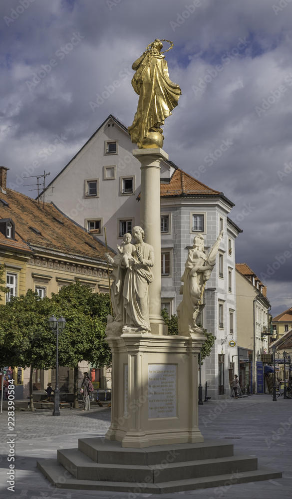 Main square (Glavni trg) in Celje with Holy Mary column in foreground, Slovenia