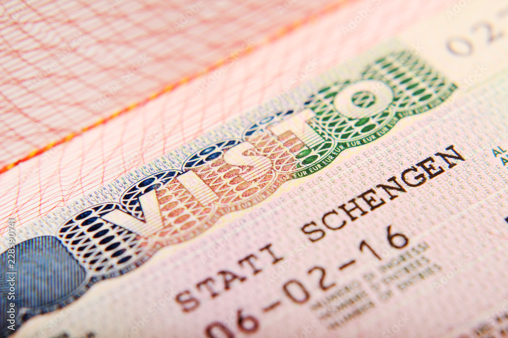Fototapeta premium Italian Schengen visa in a passport