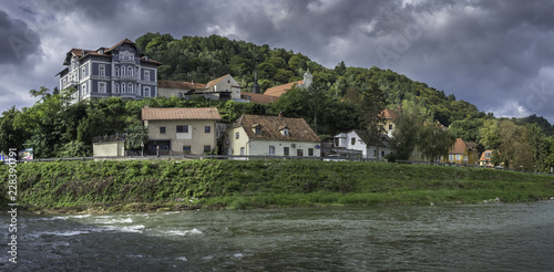 Fényképezés River Savinja, houses in Breg and town park in Celje, Slovenia