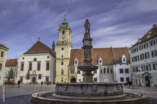 Roland Fountain and buildings on Main Square (Hlavne Namestie) in historic city center of Bratislava, Slovakia photo