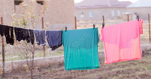 Laundry hanging in a garden © donikz
