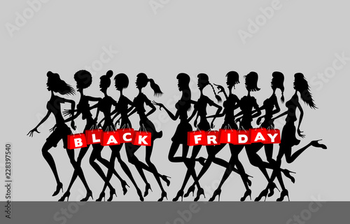 Women silhouettes with holding black friday shopping bags