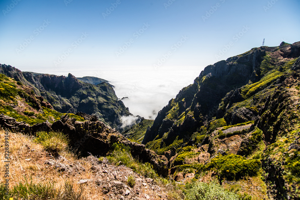 Fototapeta premium View of beautiful mountains Landscape of trek Pico do Arieiro to Pico Ruivo, Madeira island, Portugal