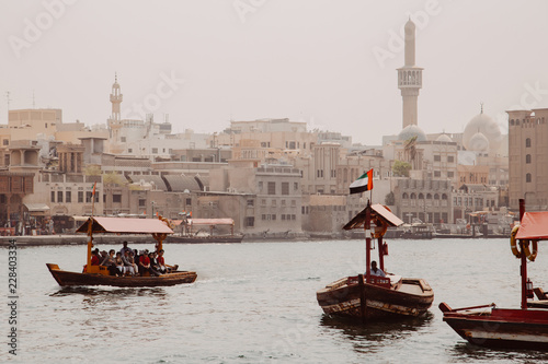 Excursion touristic boats on the Dubai Creek near old town Al Fahidi district
