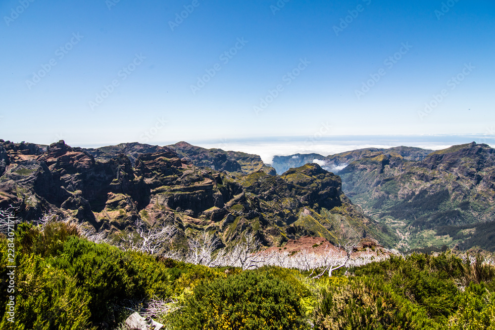 Clouds and peaks at the top of the highest mountain of Madeira Pico Ruivo, Portugal