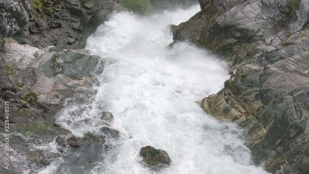 Super slow motion view of clean fresh raging water in mountain river Super slow motion view of clean fresh raging water in mountain river