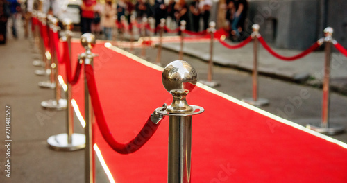 red carpet and barrier on entrance photo