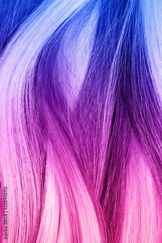 Fototapeta premium Colorful dyed hair, top view. Trendy hairstyle
