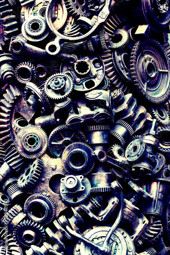 Steampunk background, machine parts, large gears and chains from machines and tractors.