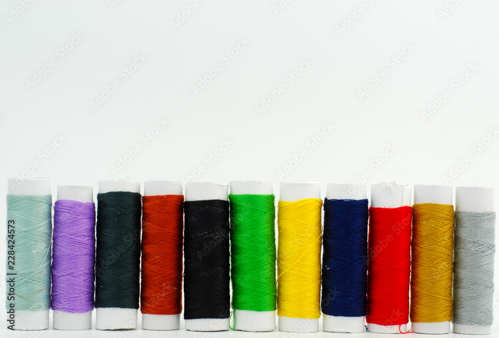 spools of thread isolated on white background spools of thread isolated on white background