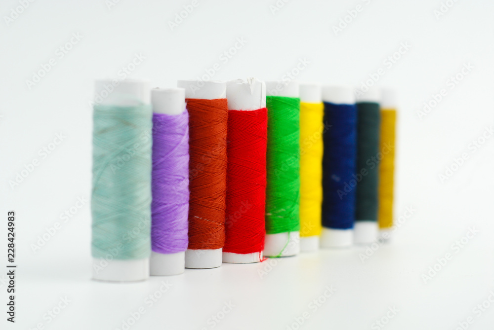 spools of thread isolated on white background spools of thread isolated on white background