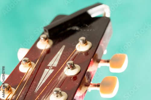 Detail of a used vintage guitar © donikz