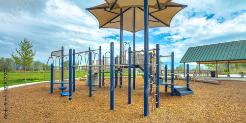 Фотография Childrens playground under cloudy sky in Lehi Utah