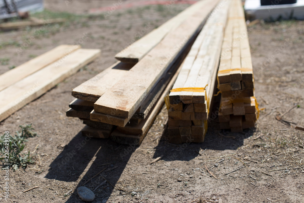Fototapeta premium Wooden rafters at the construction site