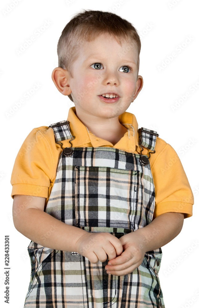 Portrait of cute little boy in orange shirt isolated on white Portrait of cute little boy in orange shirt isolated on white