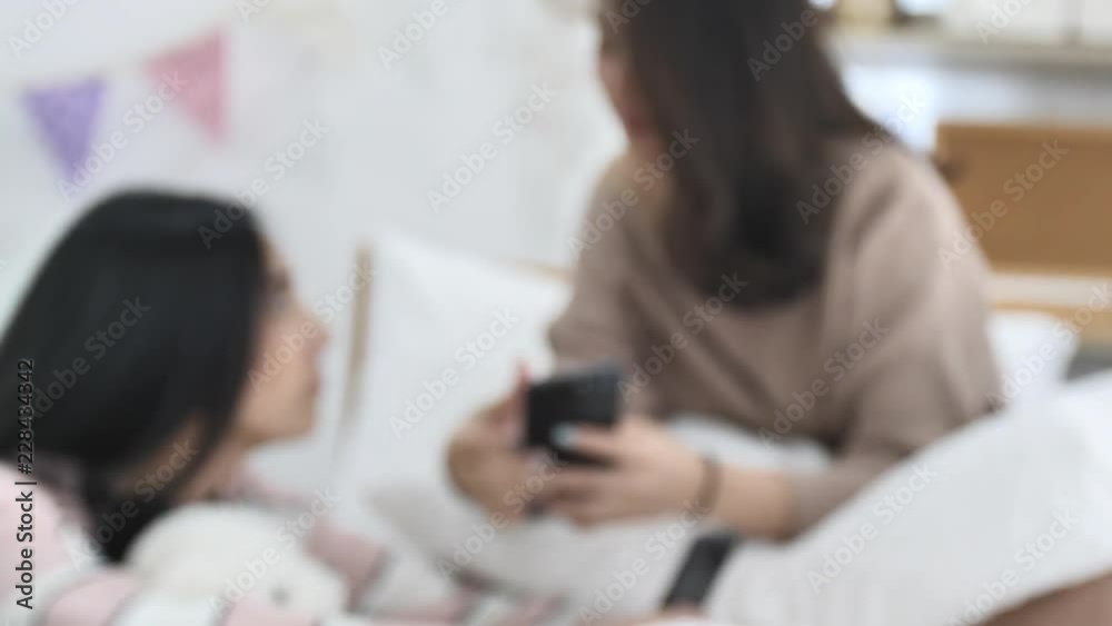 Slow motion of beautiful asian girl using mobile cellphone with smile face. Slow motion of beautiful asian girl using mobile cellphone with smile face.