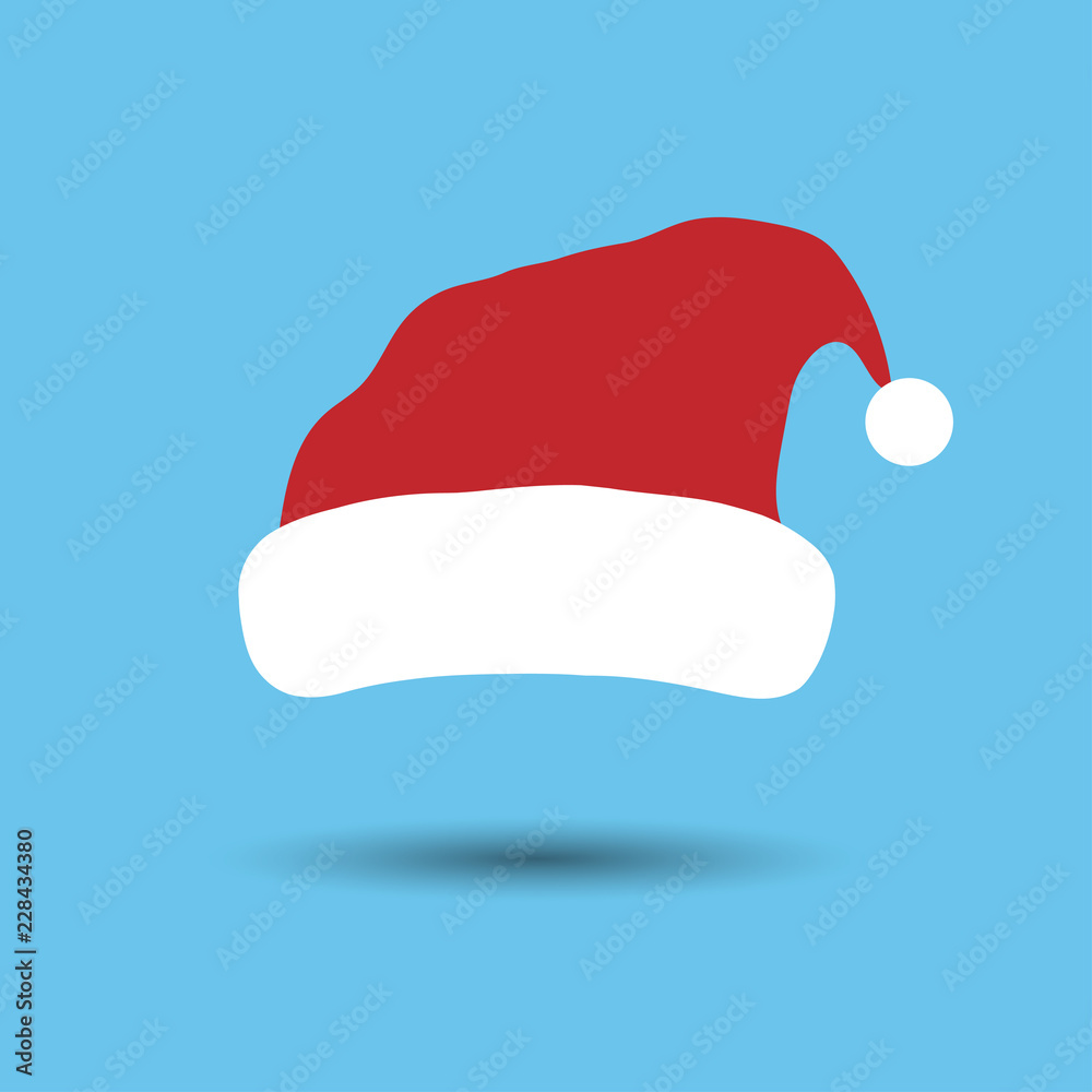A Red Santa Claus hats. Christmas and new year accessory isolated on blue background. A Red Santa Claus hats. Christmas and new year accessory isolated on blue background.