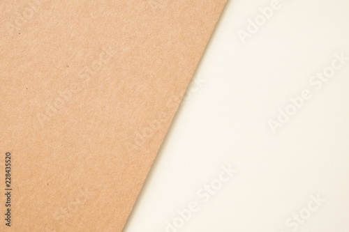 Kraft paper sheet overlap with brown and white colors for background, banner, presentation template.