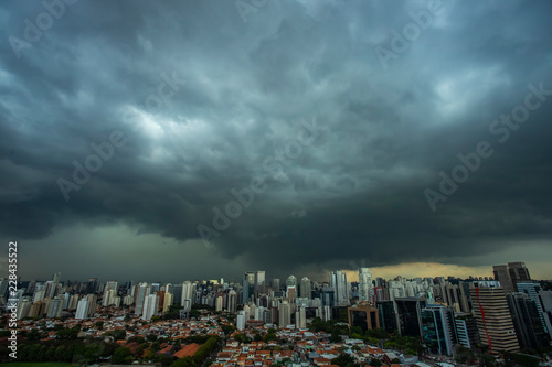 Fototapeta Naklejka Na Ścianę i Meble -  The storm is coming. Hurricane. Ground and sky. Cityscape. Sao Paulo city landscape, Brazil South America. 