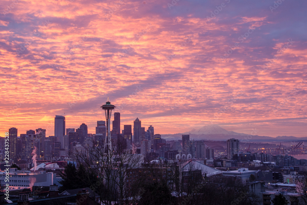A rare looks at the earth's shadow during a colorful Seattle winter sunrise