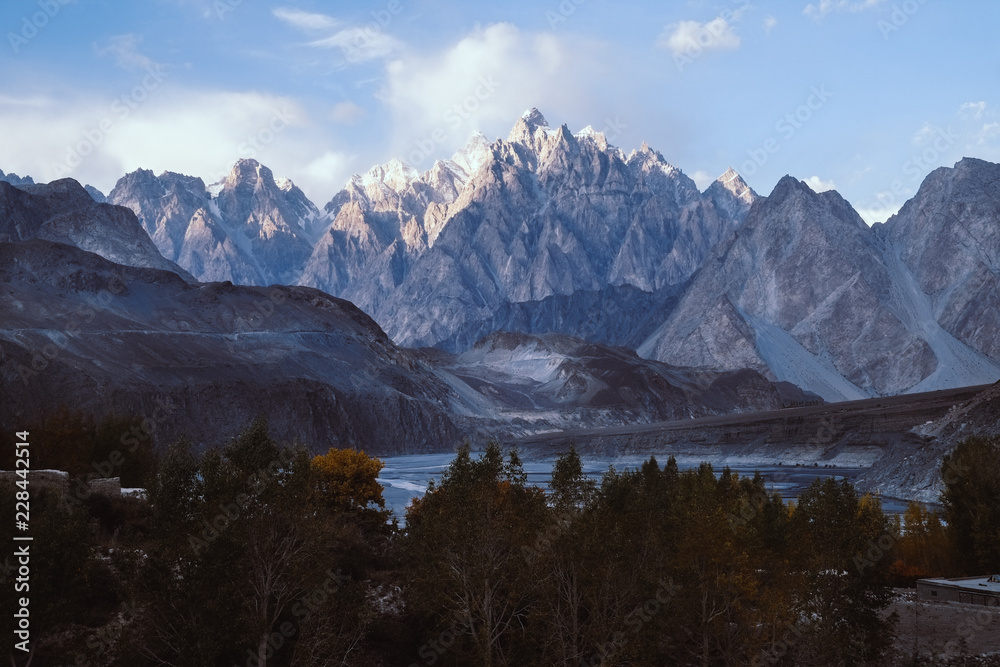 Nature landscape view of Passu cones in Karakoram mountain range in the blue hour. Gojal Hunza valley, Gilgit Baltistan, Pakistan