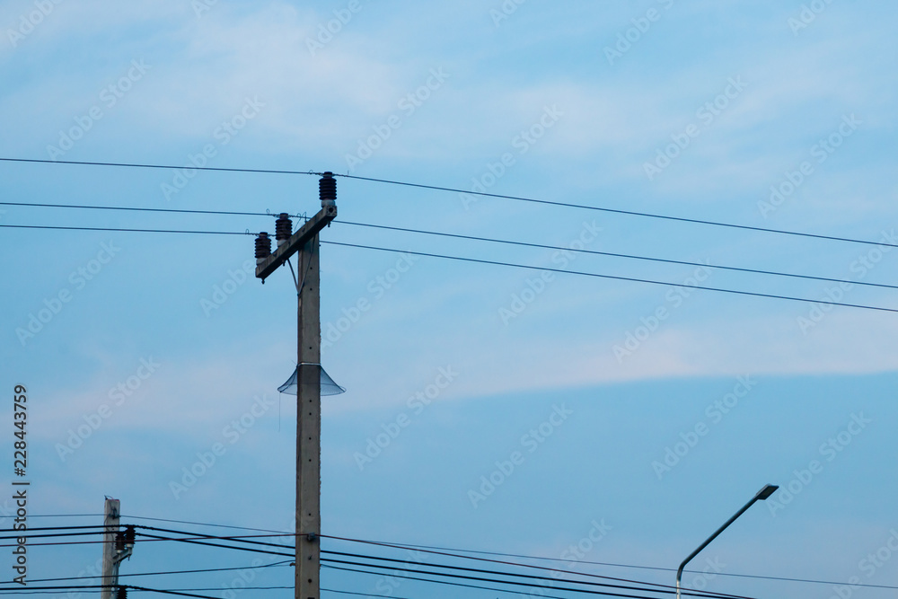electric receive pole and signal wire or connection line and blue sky background . electric receive pole and signal wire or connection line and blue sky background .