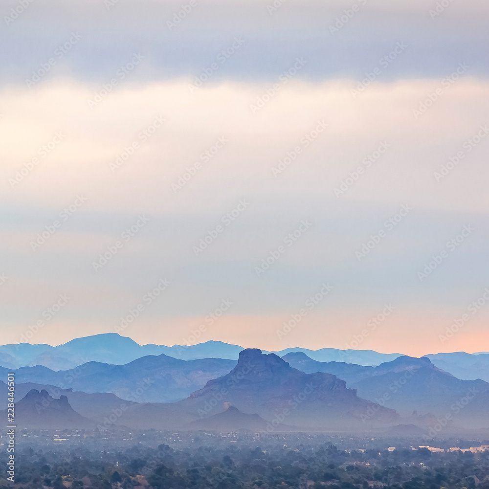 Mountain range of Arizona beneath a misty sky