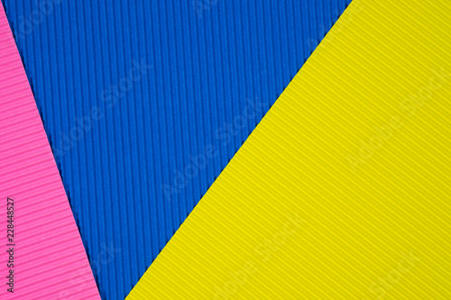 Multi coloured corrugated paper texture, use for background. vivid colour with empty space for add text or object.