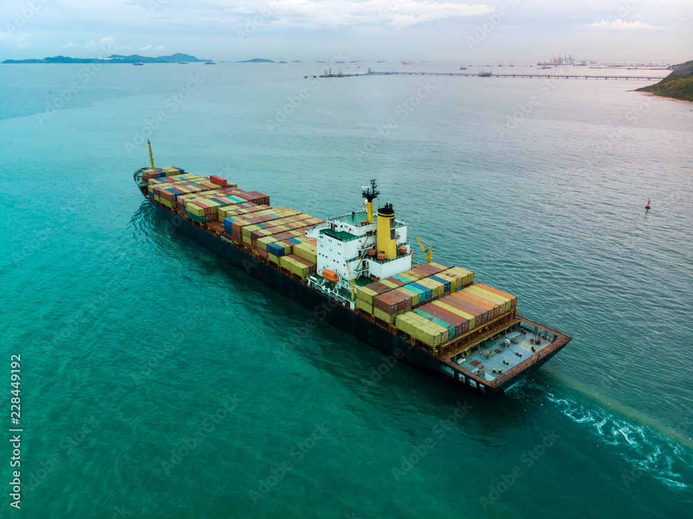 Fresh colorful Container cargo ship, Business International trade and Container logistics export-import harbor to the International port / Shipping Containers concept