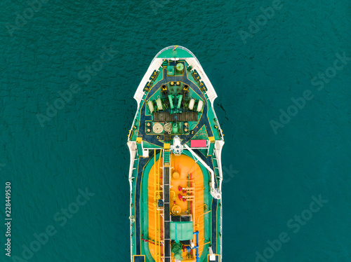 Aerial Top View of sea freight, Crude oil tanker lpg ngv at industrial estate Thailand / Crude Oil tanker to Port of Singapore - import export around in the world © AU USAnakul+