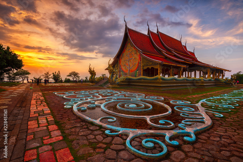 Sunset scene of  Wat Sirindhorn Wararam or Wat Phu Prao,Buddhist temple in Ubon Ratchathani Province,Thailand © Satjawat