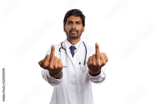 Doctor holding up both middle fingers. © Thunderstock