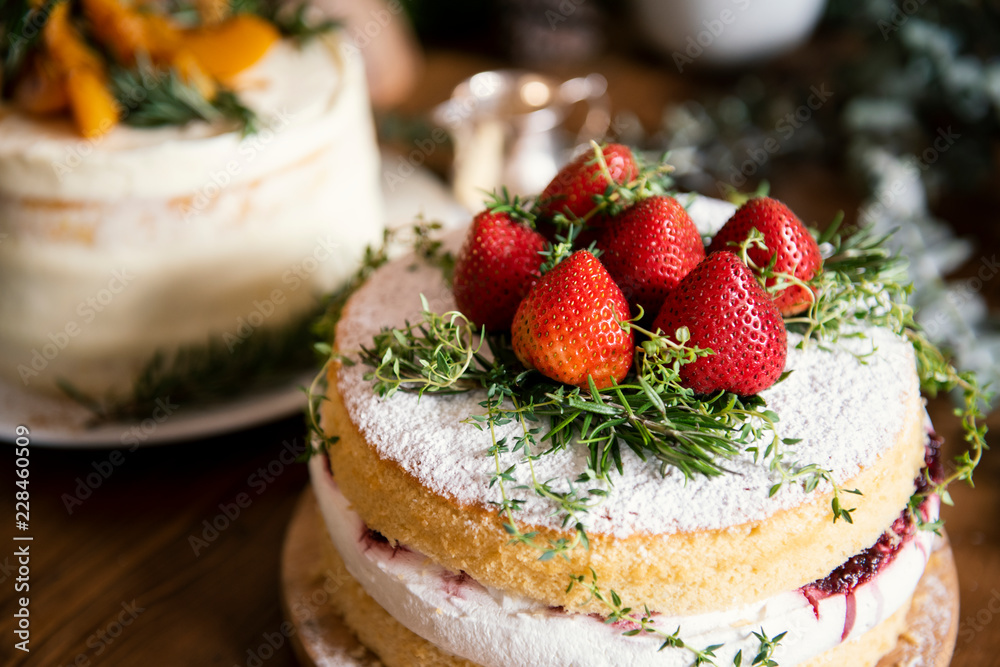 Layered cake with fresh cream and strawberries Layered cake with fresh cream and strawberries