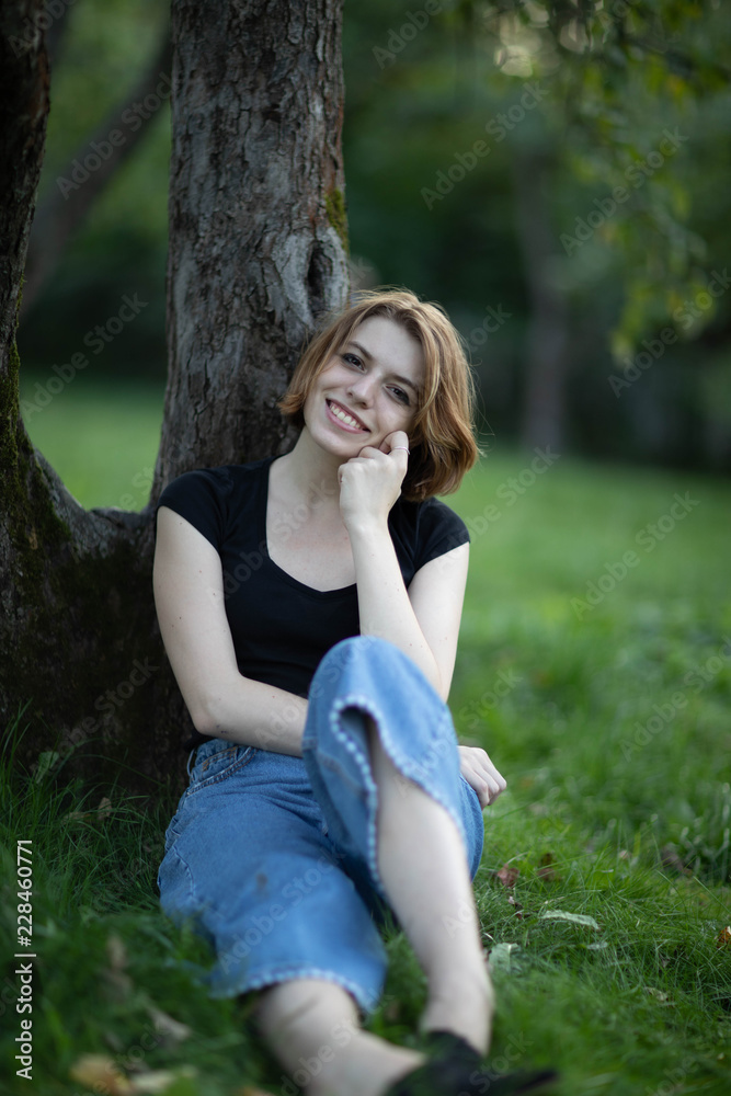 Naklejka premium Street photo shoot with a wonderful girl.Photo shoot in Moscow in the great hearth, the whipping Kolomenskoye