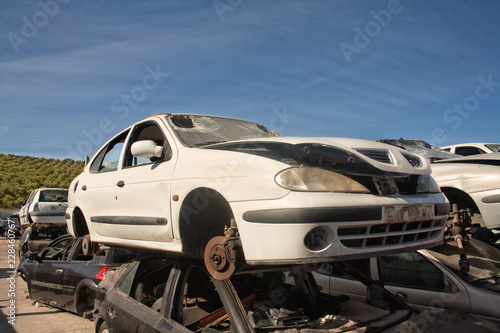 A graveyard of cars, broken cars sell on spare parts.