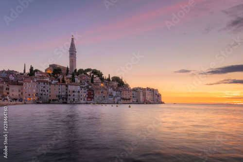 Fantastic summer sunset of Rovinj town, Croatian fishing port on the west coast of the Istrian peninsula. Colorful evening seascape of Adriatic Sea. © Kennymax